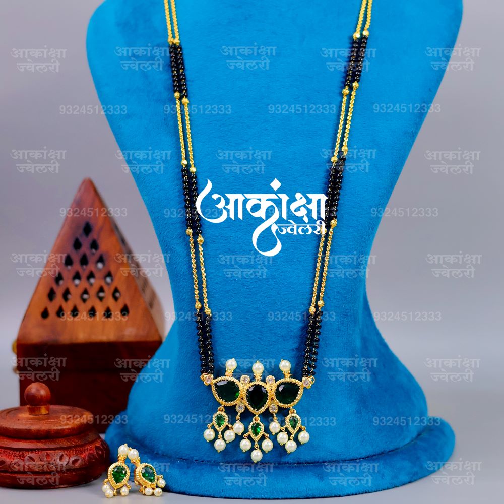 Trinaini G Tanmani Mangalsutra (Golden Mix Sari)